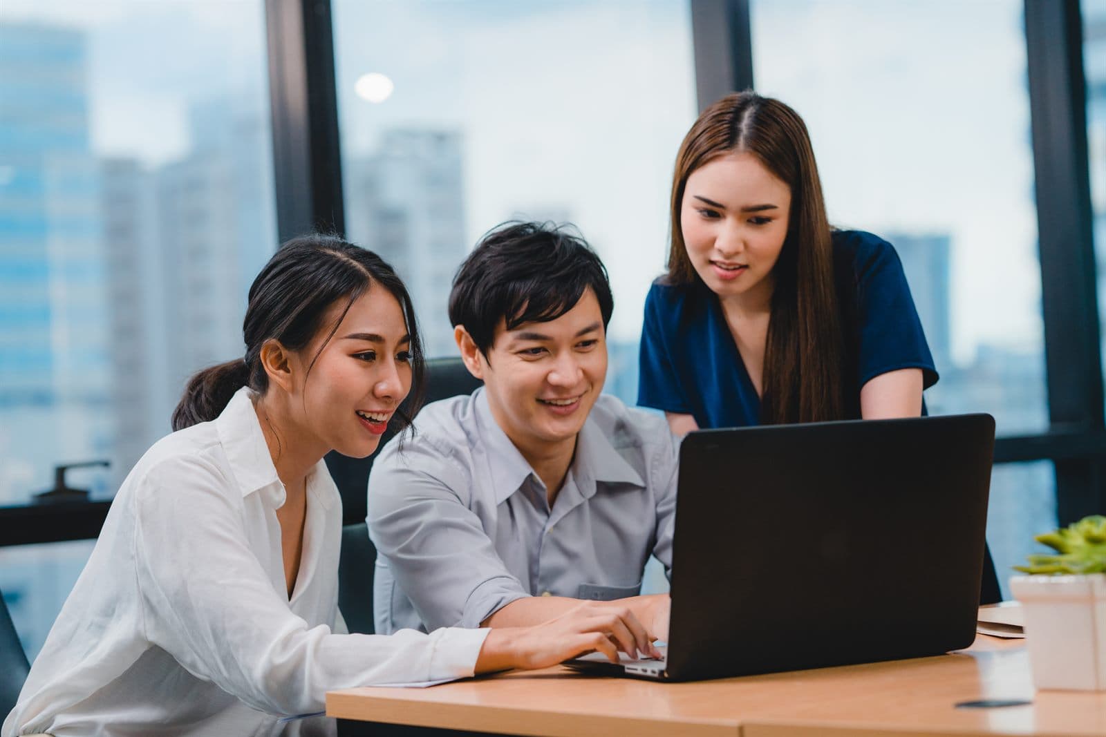 TalentFirst consultants collaborating in the office